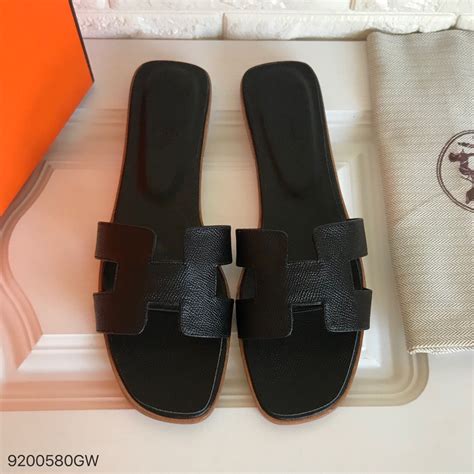 hermes slippers black|new style of Hermes slippers.